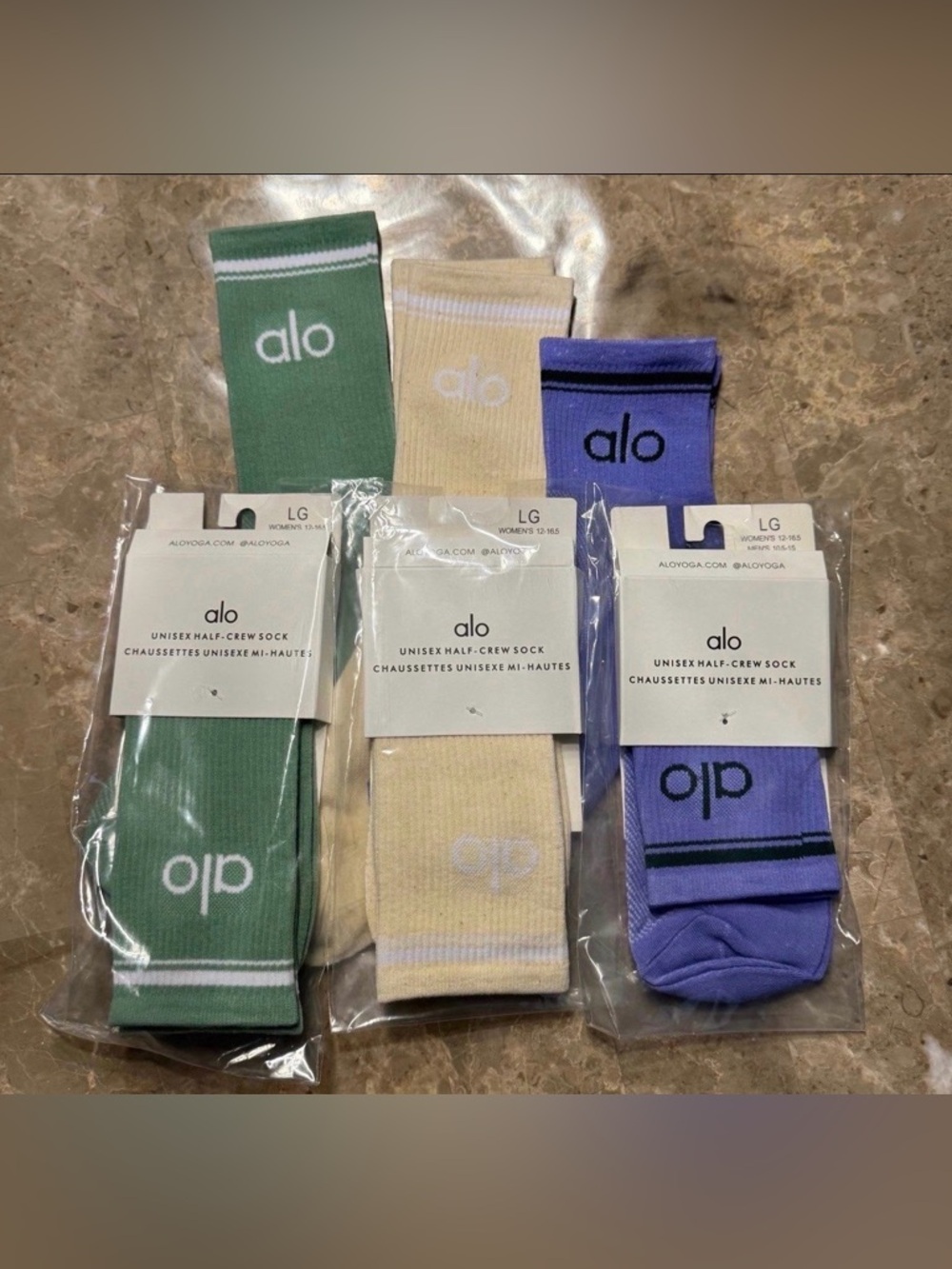 New Women’s Alo Socks 
Packaging states size Large but they fit sizes 6-11
